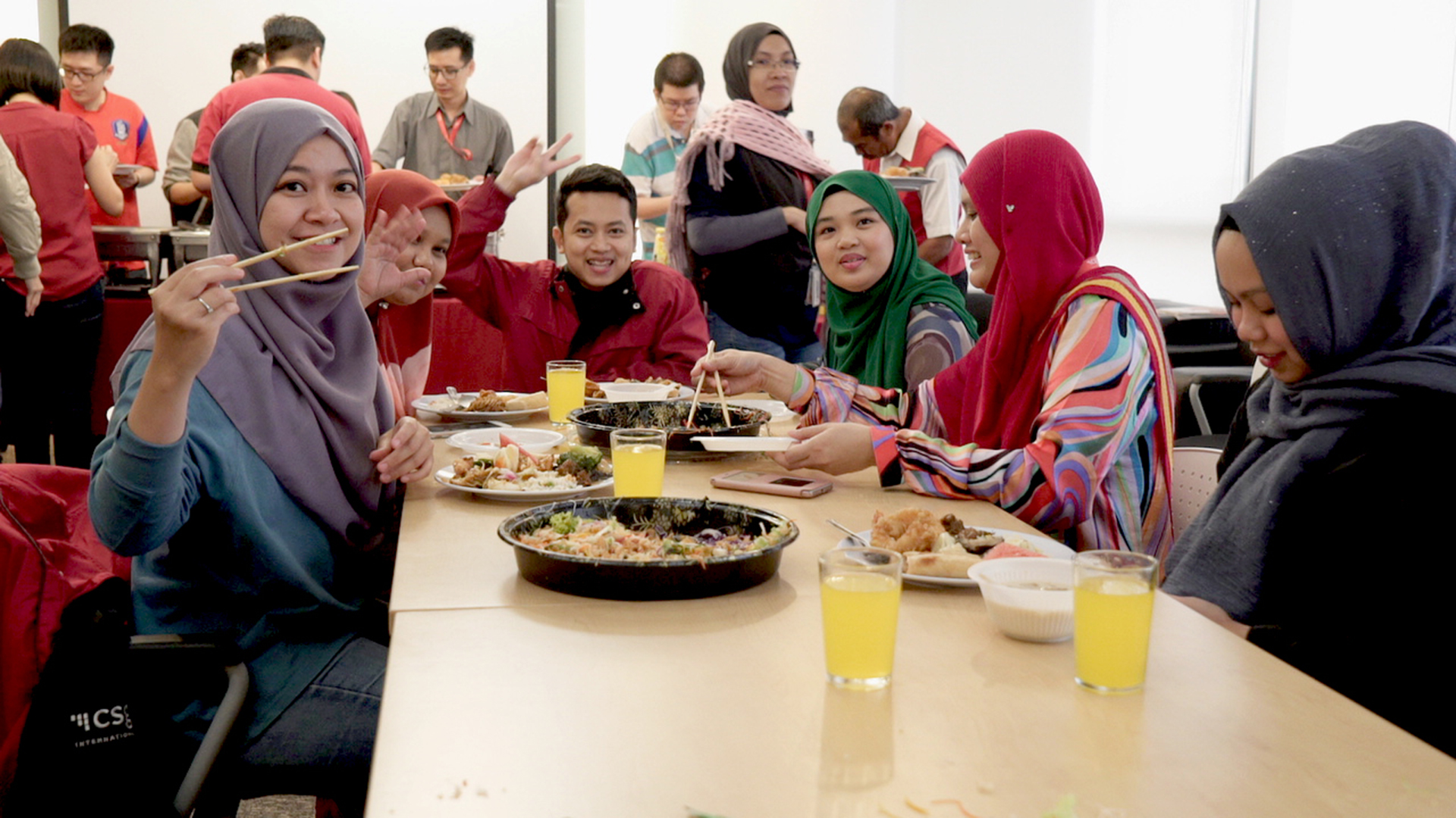 CSG employees sitting together at lunch