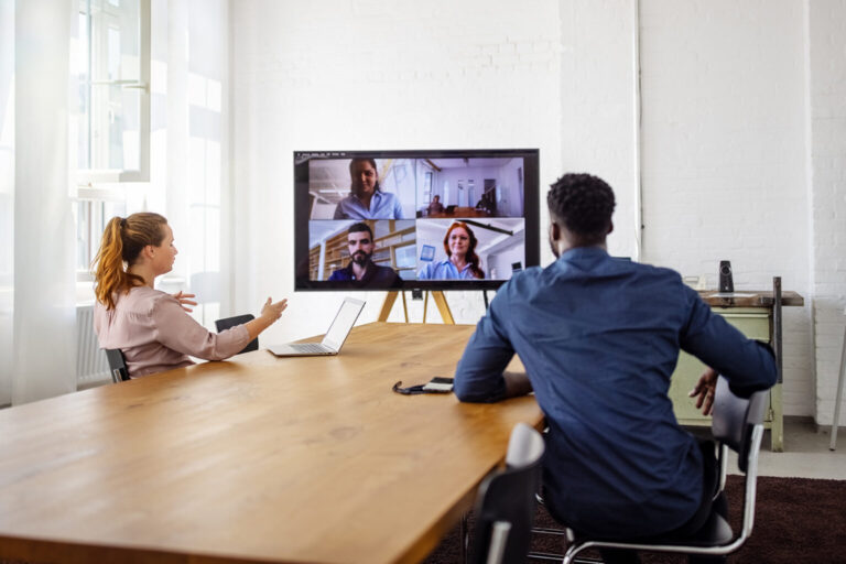 Businesspeople having a video conference in office