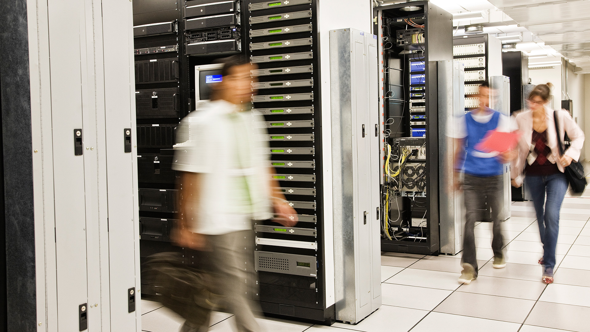 technicians working in large data center